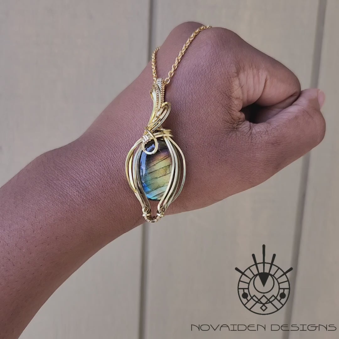 Load and play video in Gallery viewer, Rainbow Labradorite in Brass Pendant