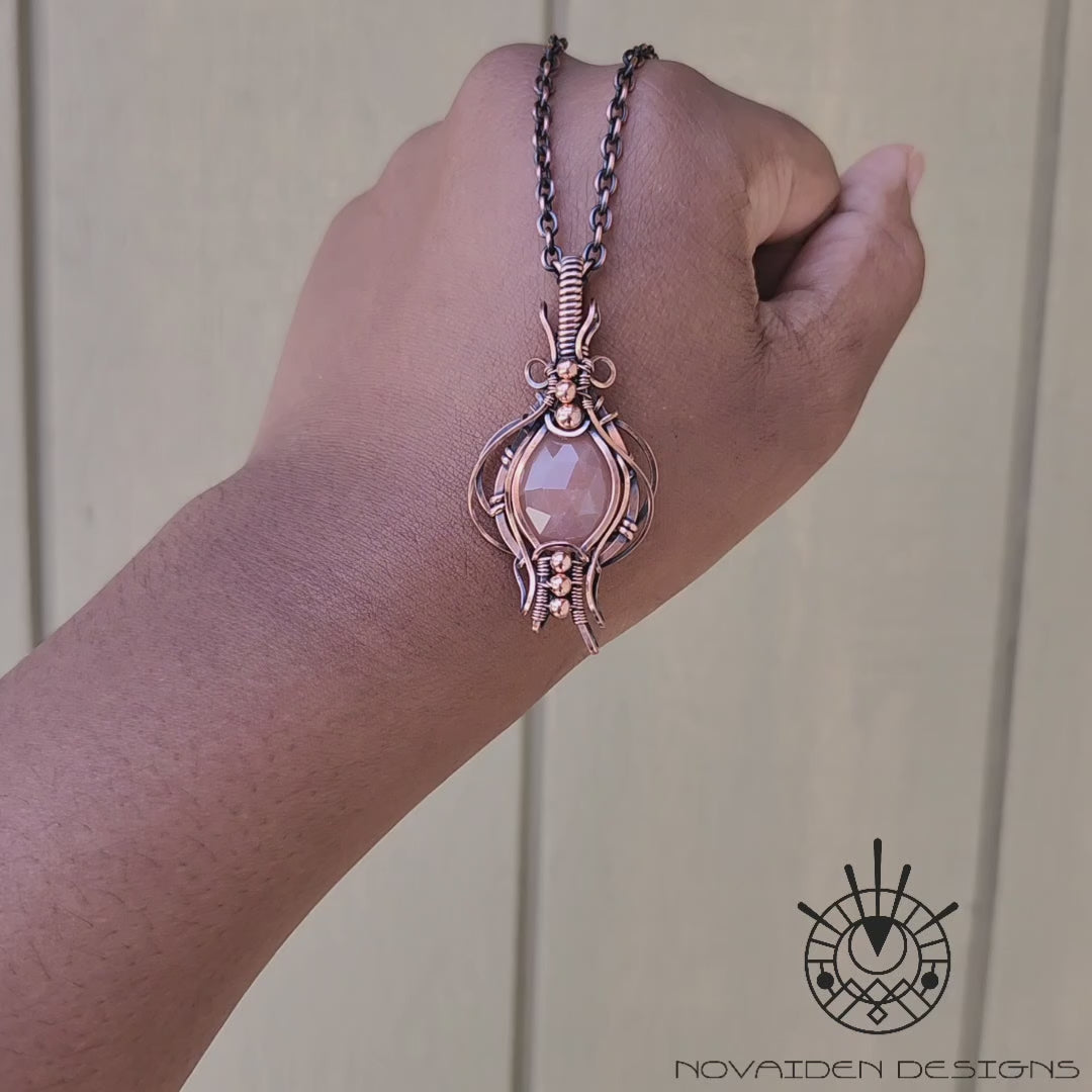 Load and play video in Gallery viewer, Faceted Peach Moonstone Pendant