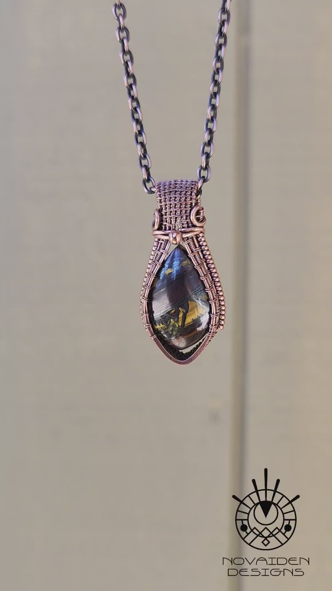 Load and play video in Gallery viewer, Tiger Iron Pendant