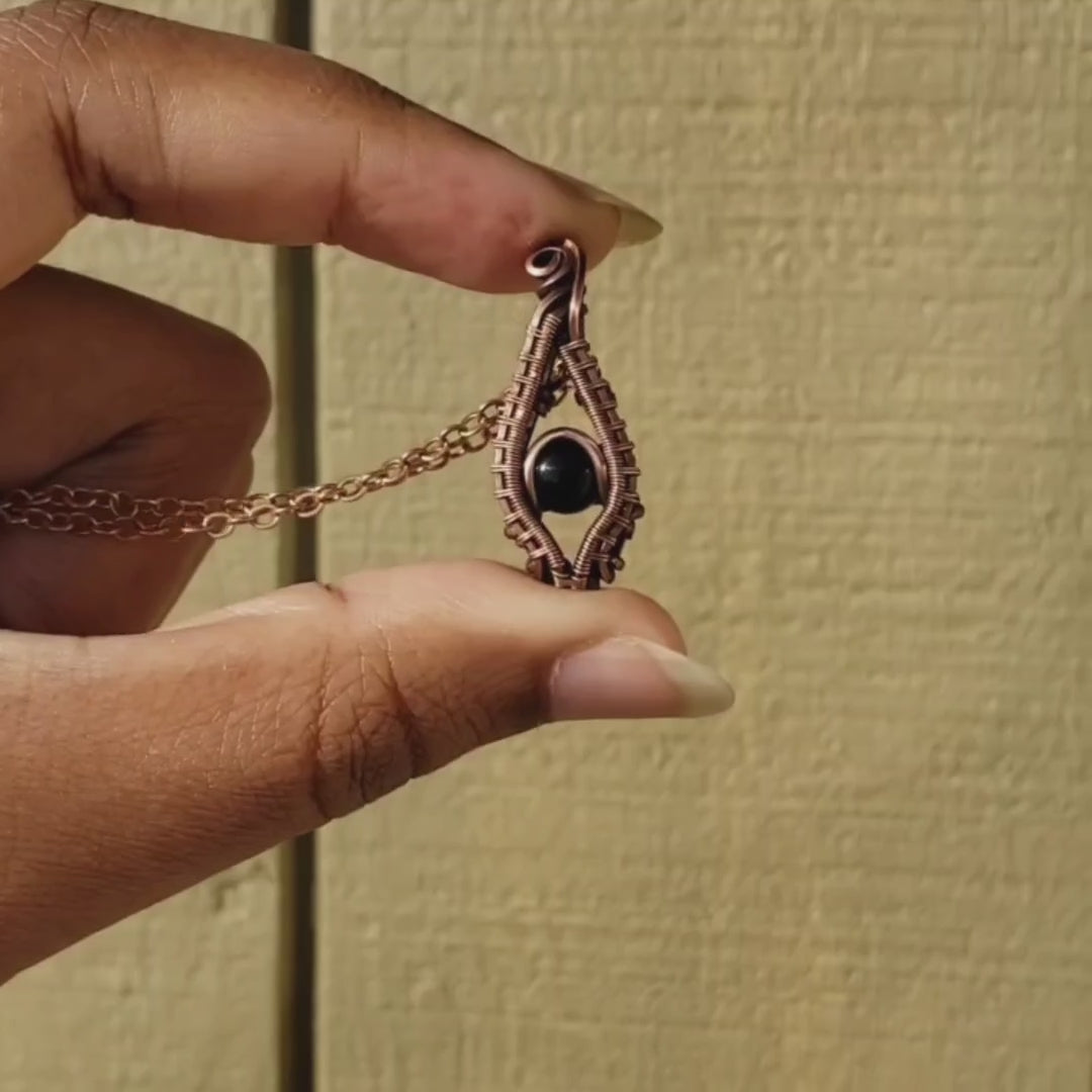 Load and play video in Gallery viewer, Black Onyx in Solid Copper Pendant