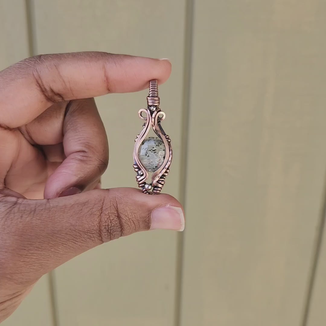 Load and play video in Gallery viewer, Faceted Green Dot Quartz Pendant