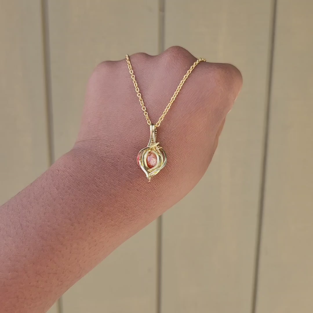 Load and play video in Gallery viewer, Brass Sunstone Mini Pendant