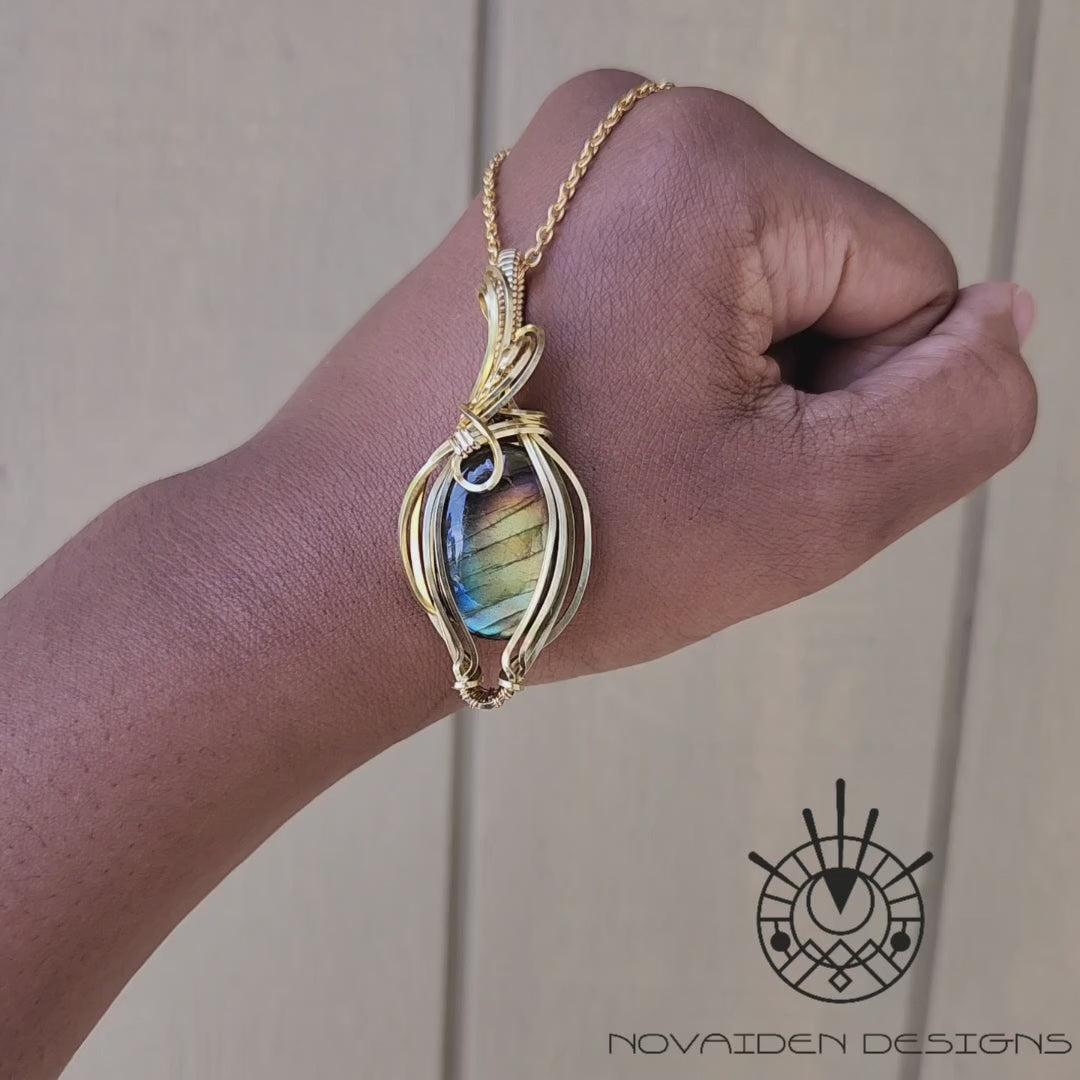 Load and play video in Gallery viewer, Rainbow Labradorite in Brass Pendant
