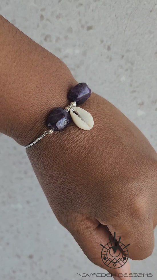Load and play video in Gallery viewer, Amethyst &amp;amp; Cowrie Shell Bracelet
