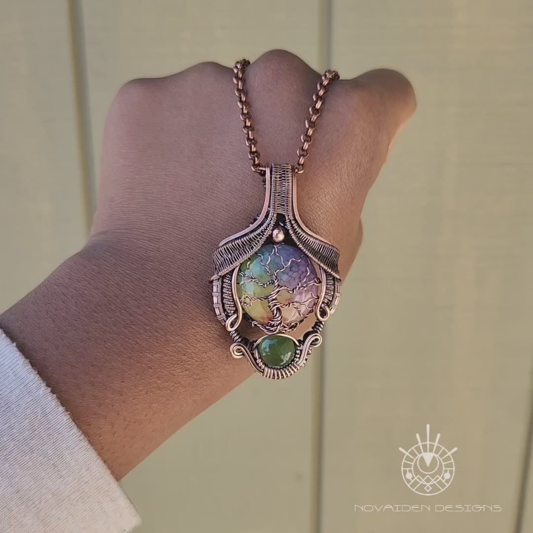 Load and play video in Gallery viewer, Rainbow Solar Quartz &amp;amp; Serpentine Regal Tree of Life Pendant
