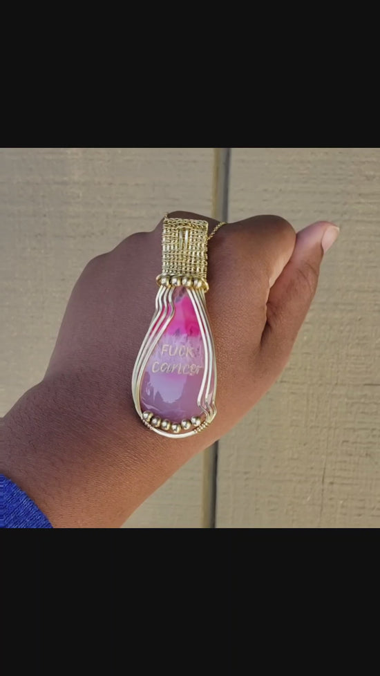 Load and play video in Gallery viewer, Brass Fuck Cancer Engraved Pink Dyed Agate Pendant
